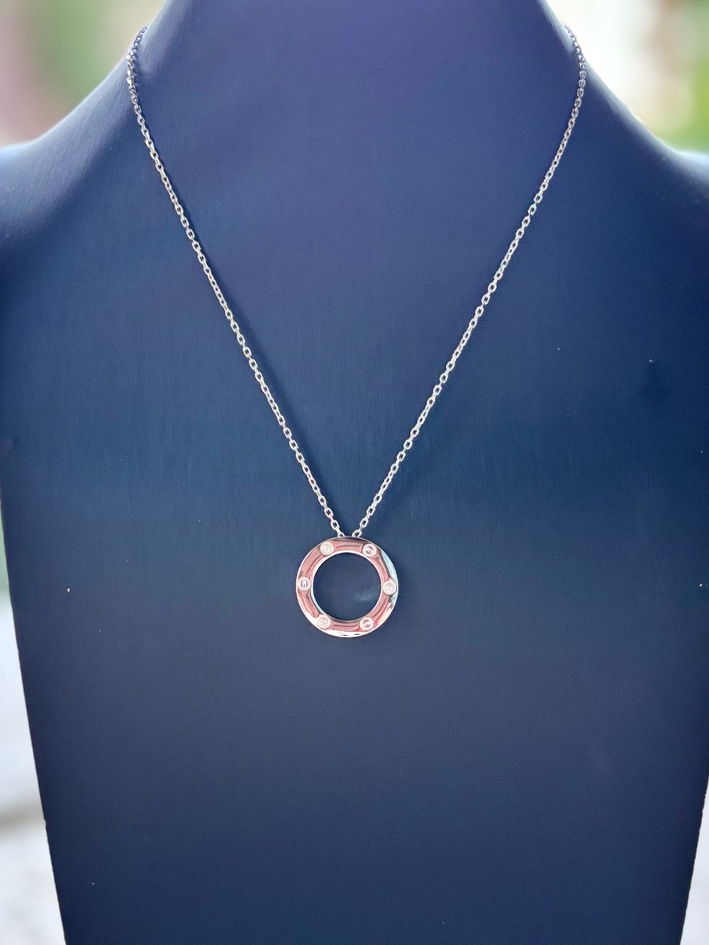 Silver Love Necklacel Circular Pendant featuring Iconic Screw Motifs